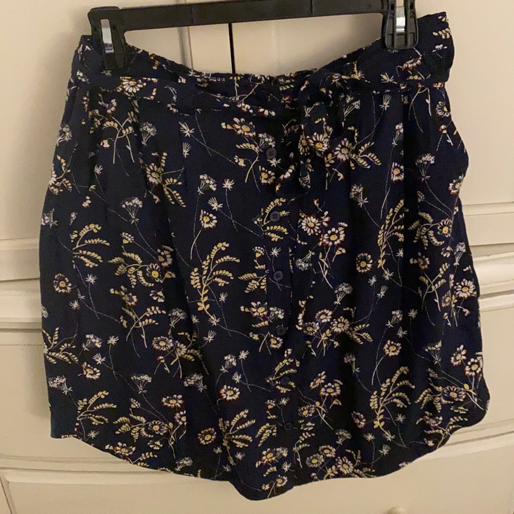 Navy pull on skirt with tie wrap option.